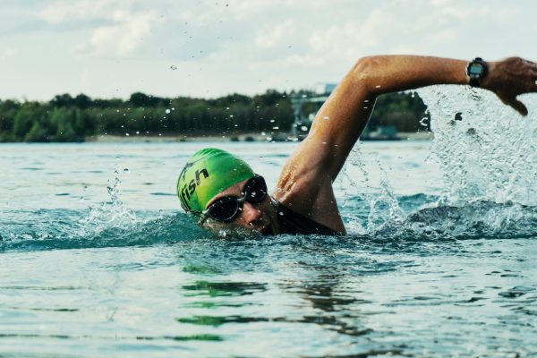 Swimming is one of the most popular forms of exercise, and for good reason. Not only is it a fun and refreshing way to cool off in the summer heat, but it also provides a wide range of health benefits for people of all ages and fitness levels. If you're looking for a low-impact workout that targets all major muscle groups, improves cardiovascular health, and boosts overall fitness, then swimming might be just what you need. Here are some of the most surprising benefits of swimming for your fitness goals. Low-impact exercise Swimming is a low-impact exercise that puts less strain on your joints than running, cycling, or other high-impact activities. This makes it an ideal exercise for people with arthritis, back pain, or other chronic conditions that make high-impact exercise difficult. Full-body workout Swimming engages all major muscle groups in your body, including your arms, shoulders, back, core, hips, and legs. It is one of the few exercises that provides a full-body workout, which can help you build strength, tone your muscles, and improve your overall fitness level. Cardiovascular health Swimming is an excellent cardiovascular workout that can improve your heart and lung health, increase your endurance, and lower your risk of heart disease, stroke, and other chronic conditions. Swimming can also help you burn calories, boost your metabolism, and maintain a healthy weight. Mental health benefits Swimming is a relaxing and stress-relieving activity that can help reduce anxiety, depression, and other mental health issues. It can also boost your mood, improve your self-esteem, and provide a sense of accomplishment and well-being. Improves flexibility Swimming requires a wide range of motion and helps improve flexibility and range of motion in your joints. This can help reduce the risk of injury, improve your posture, and make everyday activities easier and more comfortable. Suitable for all fitness levels Swimming is a versatile exercise that can be tailored to your fitness level, whether you're a beginner or an advanced swimmer. You can swim at your own pace, increase the intensity of your workout, and adjust the distance and duration of your swim to meet your fitness goals. Social activity Swimming is a social activity that can be enjoyed with family, friends, or in a group setting. It can help you meet new people, make friends, and build a sense of community around a common interest. In conclusion, swimming is a fun, refreshing, and versatile exercise that provides a wide range of health benefits for your fitness goals. Whether you're looking to build strength, improve your cardiovascular health, or reduce stress, swimming is an excellent exercise that can help you achieve your goals while enjoying the water. So, grab your swimsuit, hit the pool, and swim your way to fitness! Regenerate response Send a message... ChatGPT Mar 23 Version. Free Research Preview. ChatGPT may produce inaccurate information about people, places, or facts.